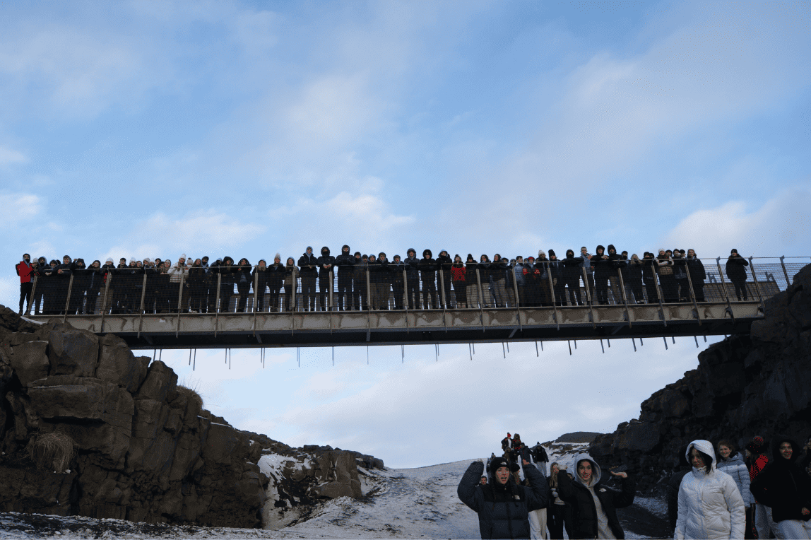 Students from Cheadle Hulme High School stand along the Bridge Between Continents in Iceland.