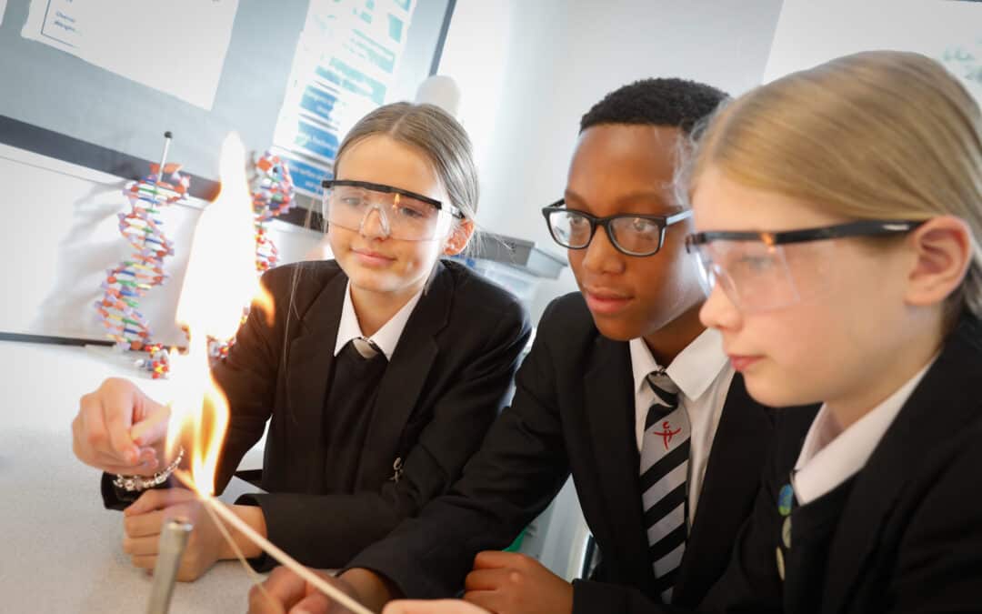Images of Cheadle Hulme High School students carrying out a Science experiment.