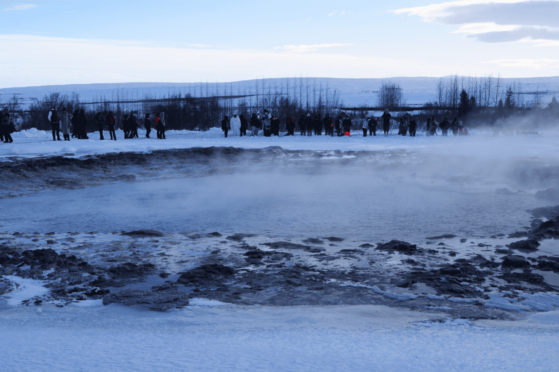 Cheadle Hulme High School students watch a hot spring in Iceland.