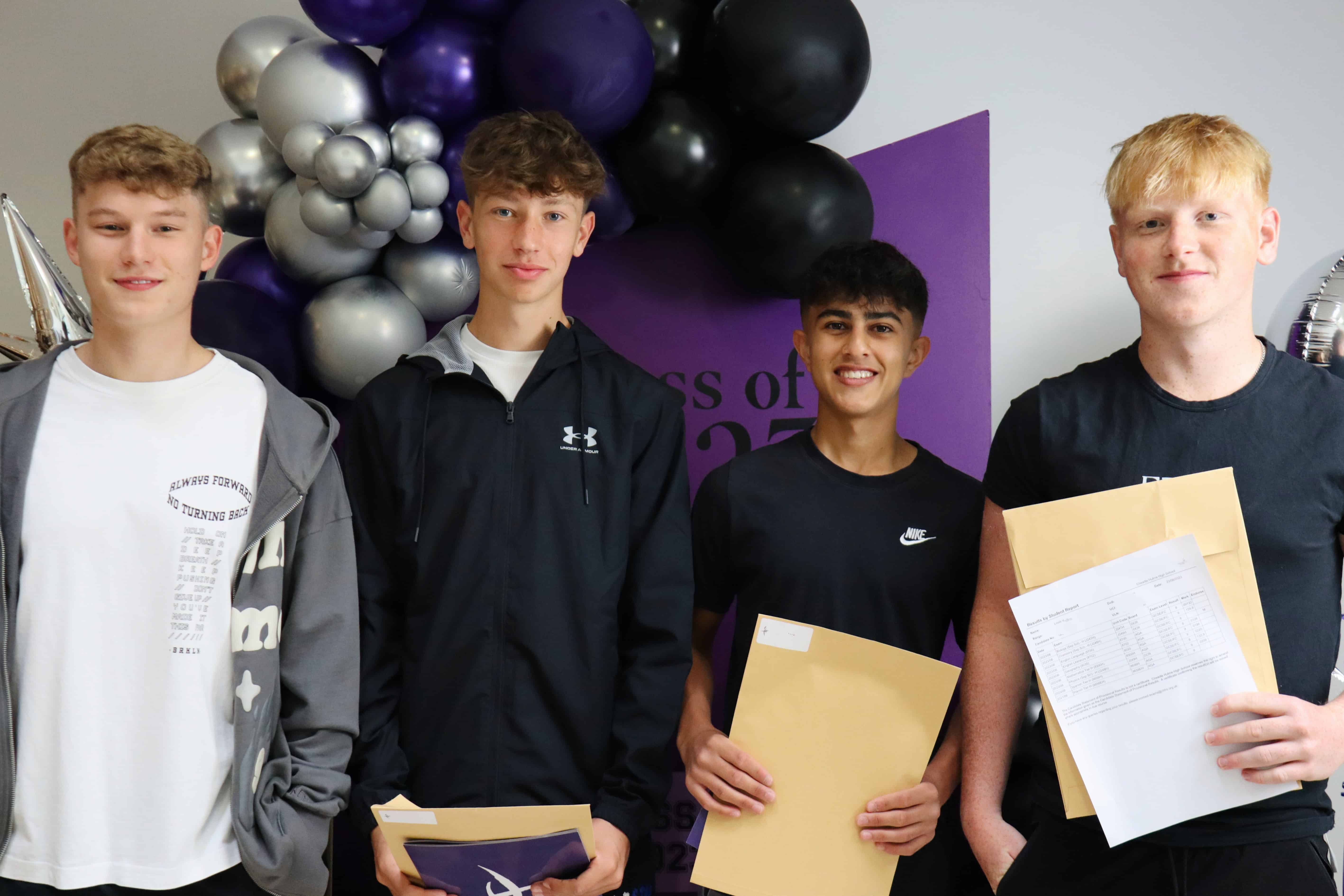 Four GCSE students from Cheadle Hulme High School stand together holding their GCSE results