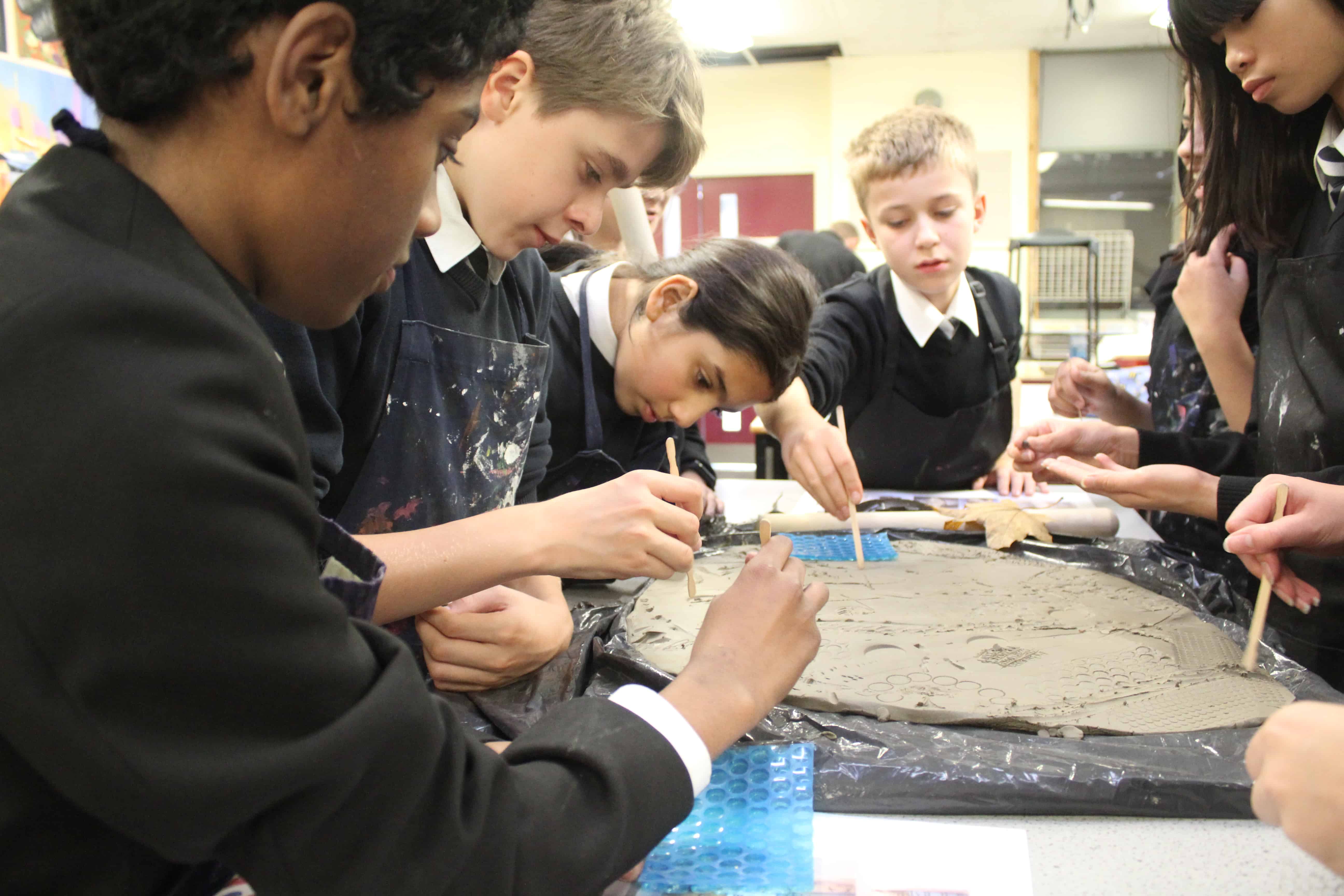 Students from Cheadle Hume High School take part in a collaborative clay workshop for the Big Draw 2023.