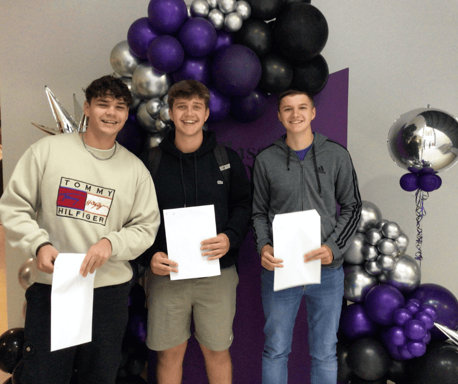Class of 2023 students in cheerful spirit as they collect their A Level results. Cheadle Hulme Sixth Form Students Robert Kenworthy, Alex Marks and Joshua Evans receiving their A Level results.