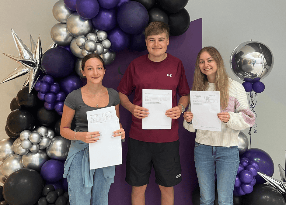 Cheadle Hulme Sixth Form Students Emily Richards, Jamie Longden and Josie Carty receiving their A Level results.
