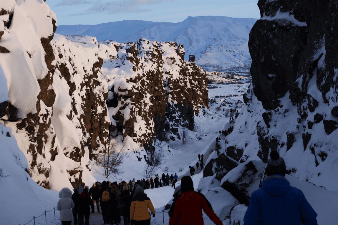 Students from Cheadle Hulme High School walk through Þingvellir National Park in Iceland.