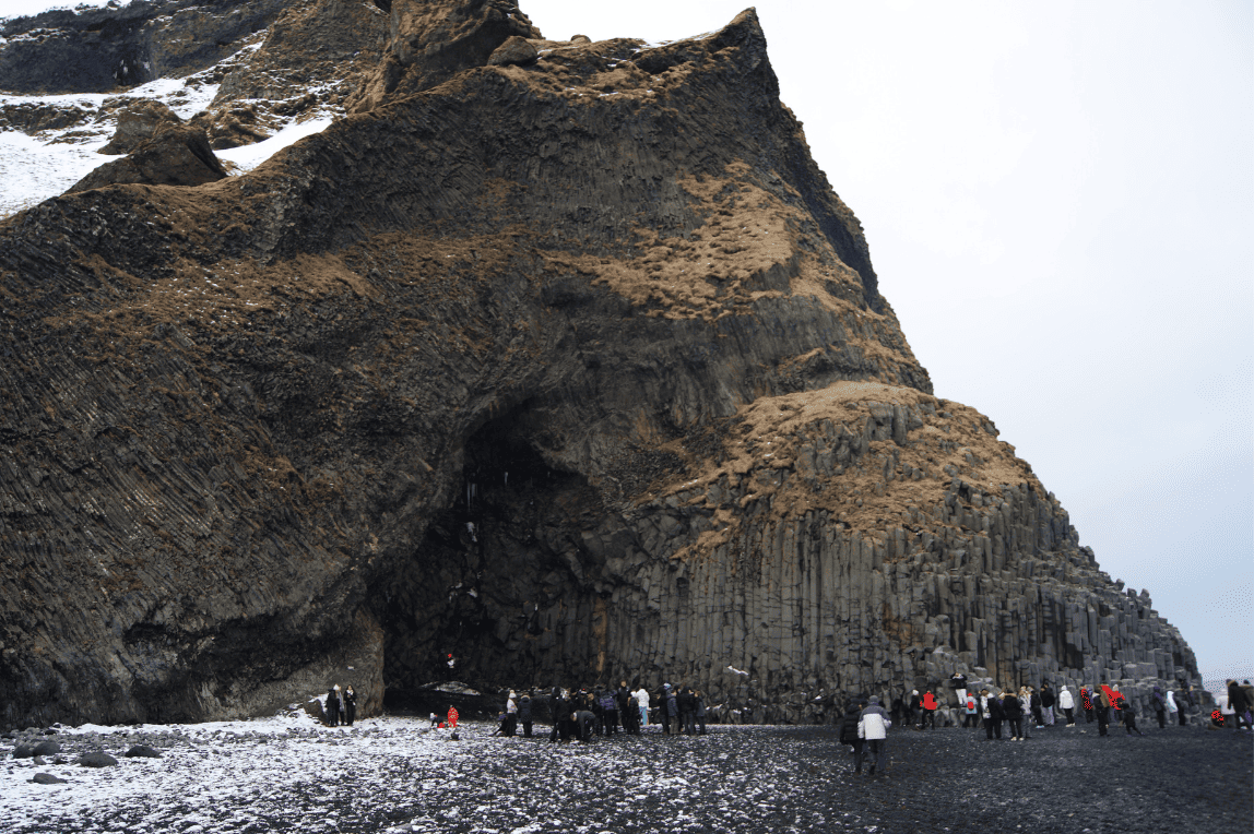 Students from Cheadle Hulme High School explore Reynisfjara beach in Iceland. 