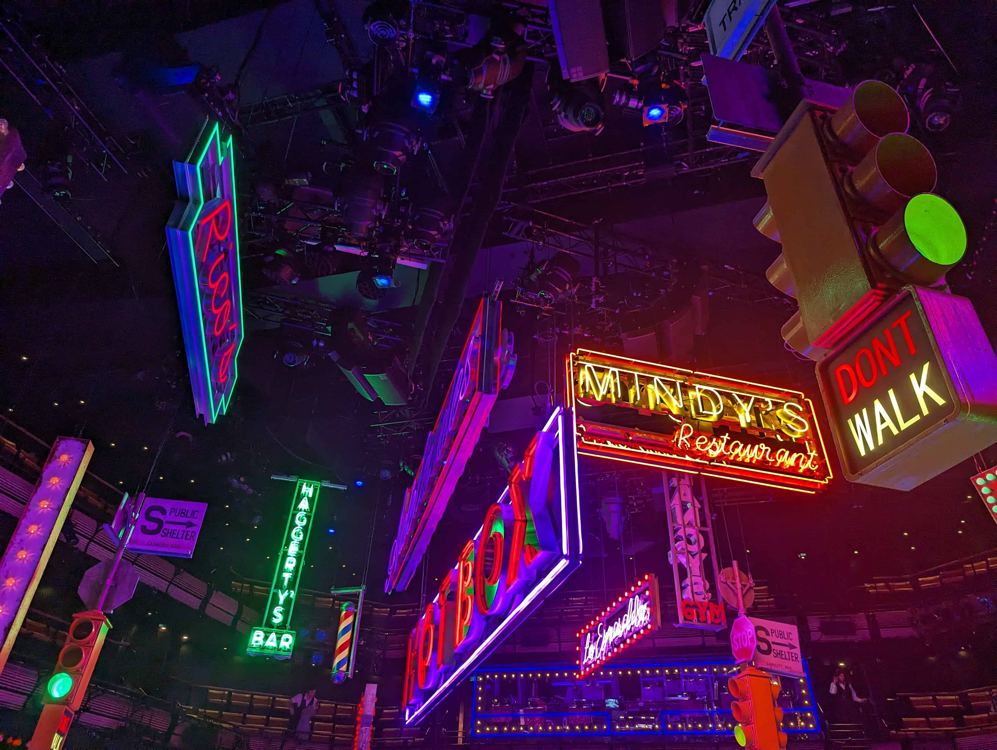 A shot of a variety of bright neon lights and signs at Guys & Dolls at the Bridge Theatre in London. Taken by Patrick in Year 11, the overall winner of the Cheadle Hulme High School Photography Calendar Competition 2024.