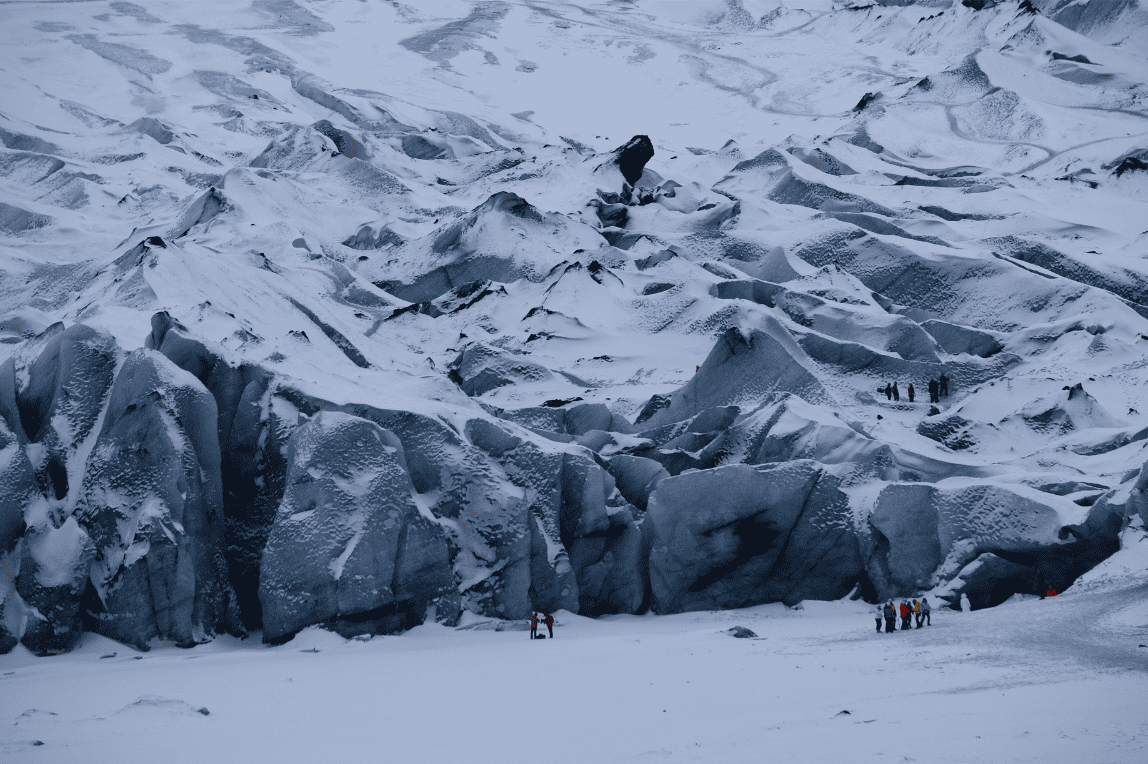 Students from Cheadle Hulme High School walk in front of Sólheimajökull in Iceland